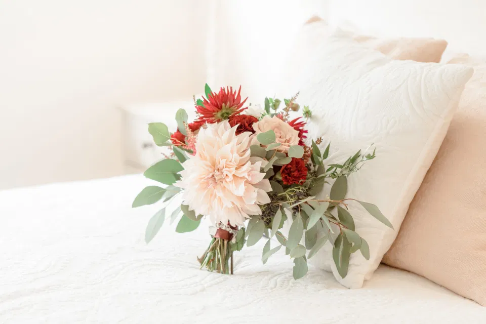 Bride Bouquet on Bed Photo - Dahlia and Eucalyptus Florals - Fall Wedding Inspiration - Amy &. Nick | Le Belvedere at Wakefield in Quebec - Ottawa Wedding Venue - Grey Loft Studio
