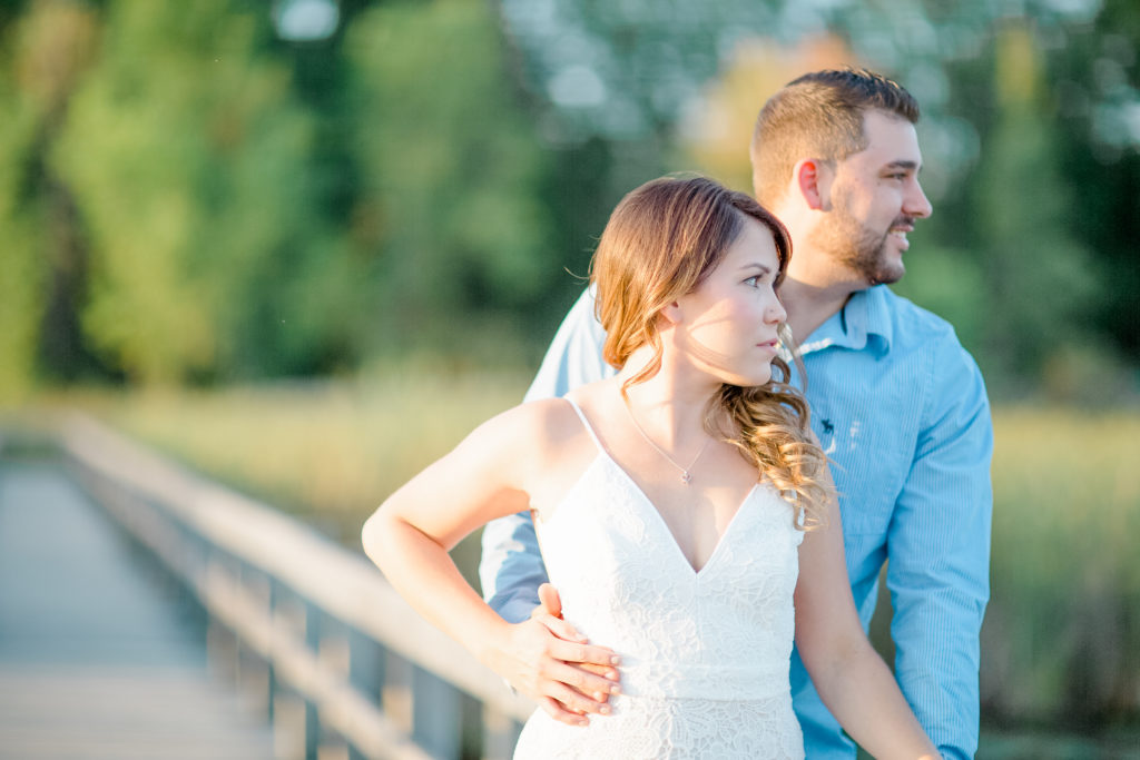 mer bleue bog engagement session in the fall backless white dress and blue dress shirt on the guy with jeans fall colour engagement session romantic engagement grey loft studio ottawa wedding photographer videographer