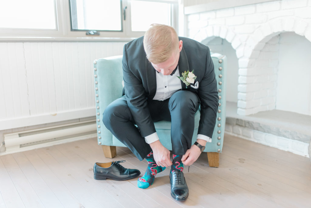 Groom Tying up shoes with Fun Socks - Wedding Day Groom Prep 