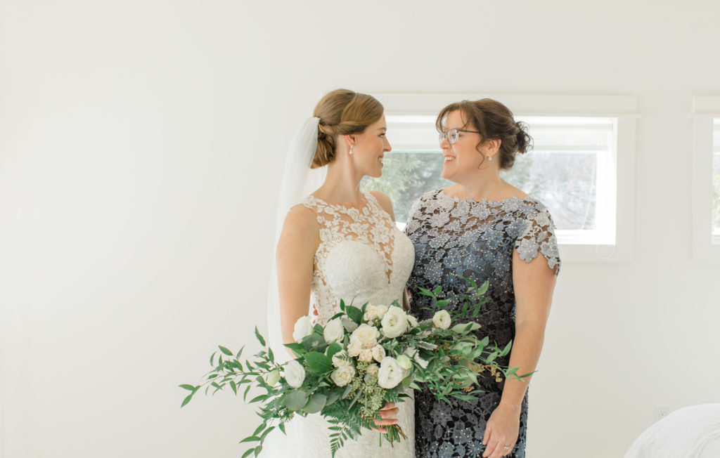 Bride with Mother Photos - Before She says I do - Cuddles with Mom- Her special day too. 
Large Wedding Bouquet - White with Greenery - Lace Wedding Dress - Eucalyptus Seeds - Spray Roses - Luscious Bouquet 