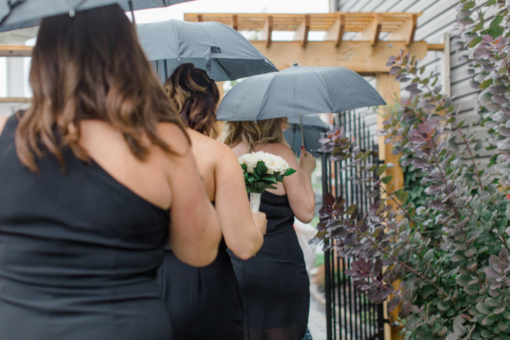 Bridesmaids walking in the Rain - Black Dresses 