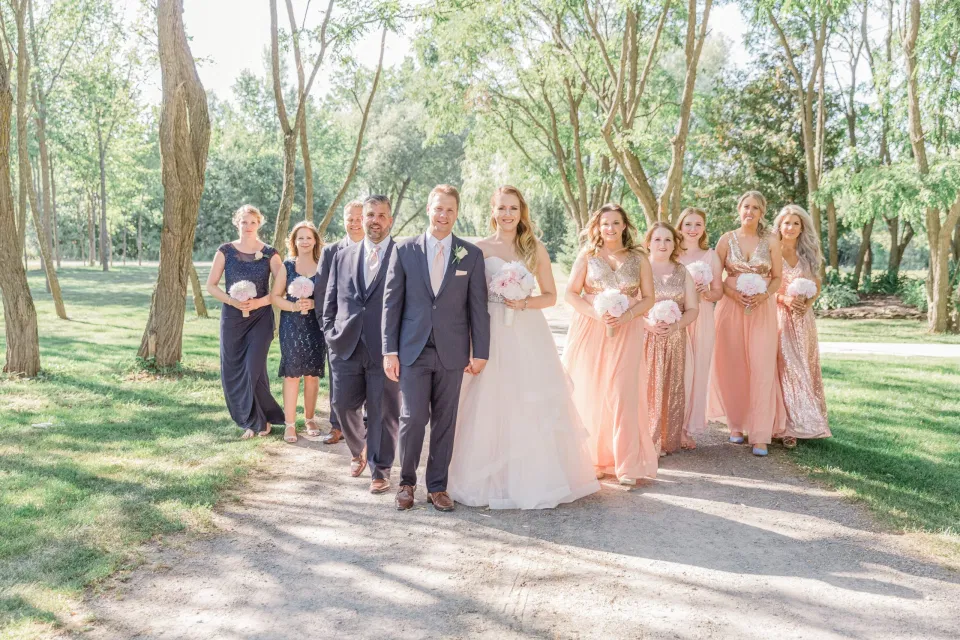 Bridal Party Photos after the Ceremony -  Stonefields Estate-  Bright and Airy - Natural Wedding Posing - Modern Wedding Blush &. Navy Wardrobe inspiration-  Romantic white with greenery, blush and navy theme. Grey Loft Studio is Stonefields Wedding and Engagement Photographer for Real couples, showcasing photos that are modern, bright, and fun.