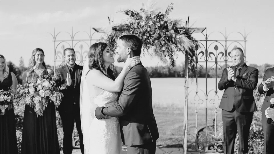 Just before the first Kiss - Bride and Groom standing at the Ceremony Site - Evermore Wedding and Events - Blue Sky, Fall Wedding. Grey Loft Studio Photography & Videography Ottawa