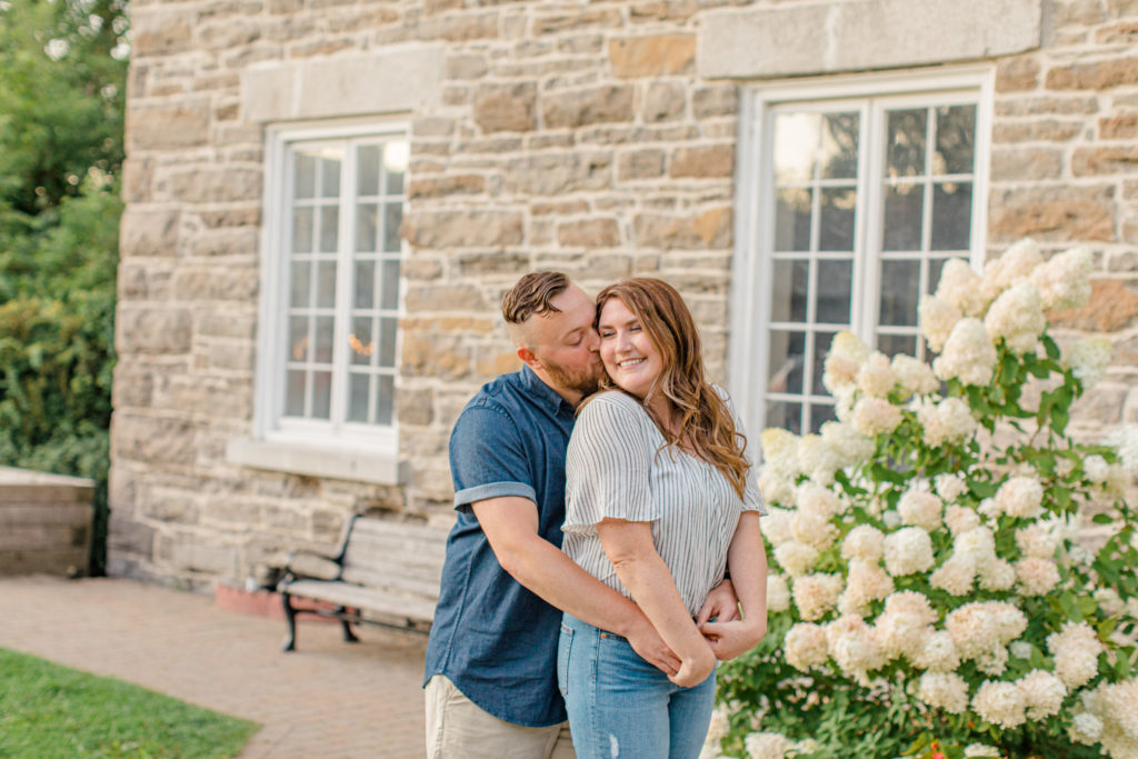 Watson's Mill Engagement Session Manotick - Bright & Airy photography - Grey Loft Studio - Ottawa Wedding Photographer - Ottawa Wedding Videographer - Engagement Session Locations in Ottawa - Summer Engagement session - Light blue and Cream with casual jeans and strap sandals. Ottawa Photo Studio.
