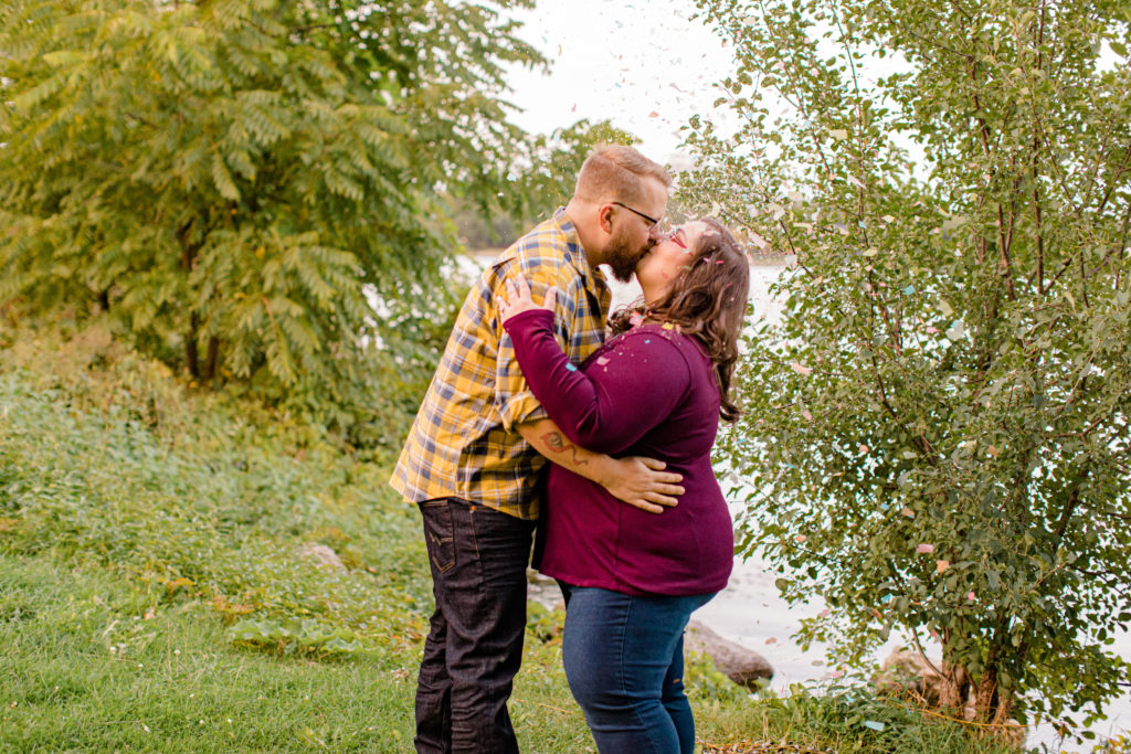 Confetti Kiss during an Engagement Session - Ottawa Wedding Photographer - Grey Loft Studio - Wedding in Ottawa -  during Photo Session
Yellow & Plaid with Burgundy Knit Sweater and Jeans