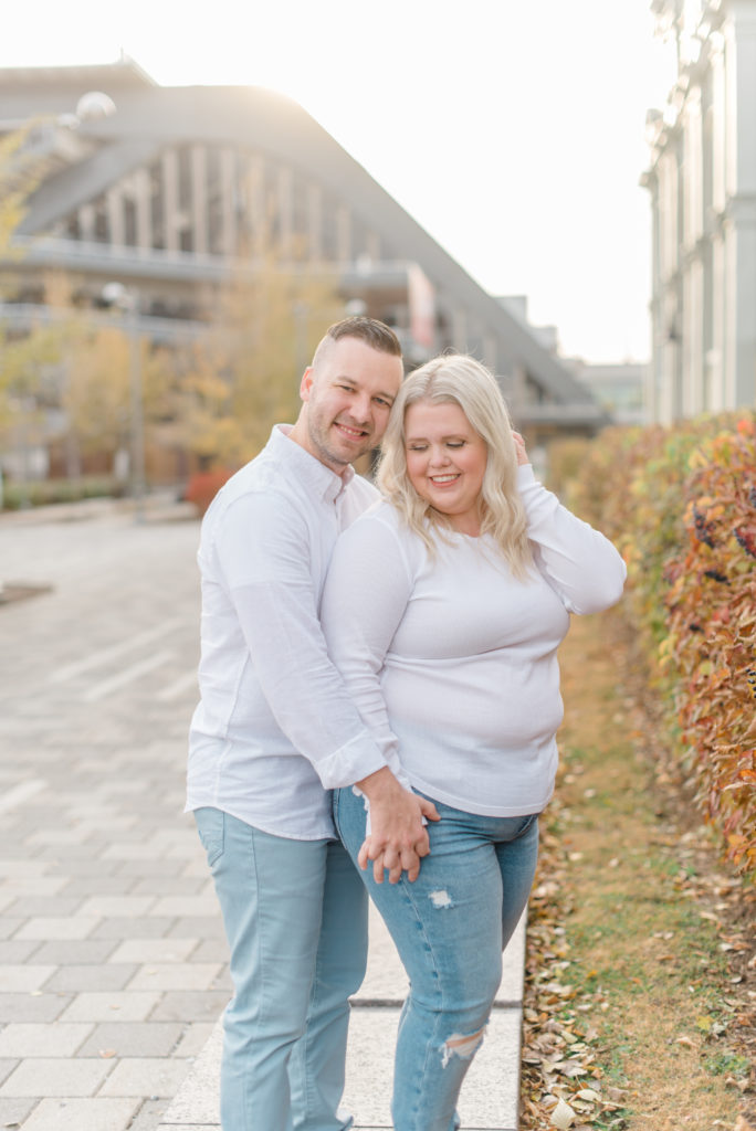 Husband & Wife posing in Downtown Ottawa at Lansdowne Park -
Sunny Fall Day shot at Sunset - wearing white shirts and blue jeans
Grey Loft Studio - Ottawa Wedding Photographer - Wedding Photo Studio - Matching couple - Poses ideas - Photoshoot ideas - Photoshoot location