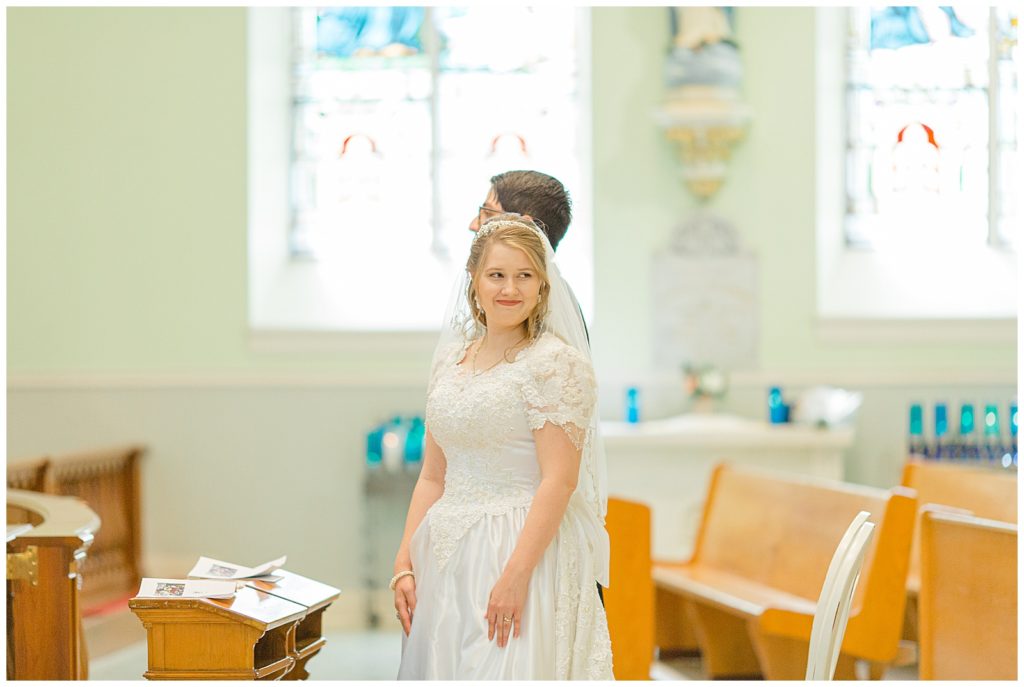 Bride smiling at family - St Clements Parish Ottawa - Wedding Day - Grey Loft Studio - Wedding Photographer